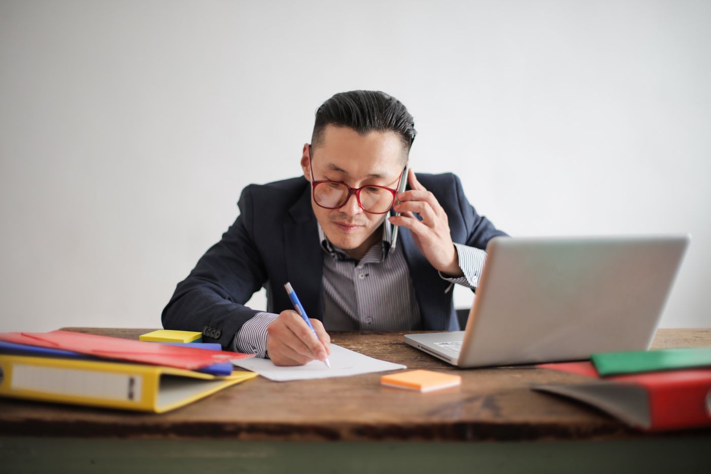 A finance officer preparing a payment run at a desk