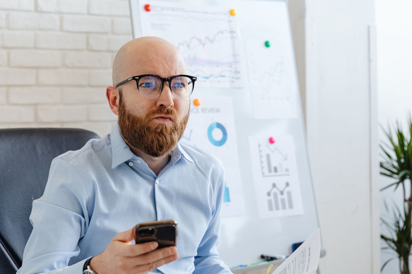 A manager approving a request on a smartphone